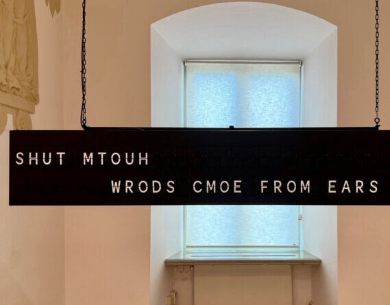 Shilpa Gupta, Words Come From Ears, 2018, Motion flapboard, 15-minute loop, 43 x 244 x 13 cm; photograph by Par Fredin, courtesy of the artist, Uppsala Art Museum, and the Henry Moore Institute.