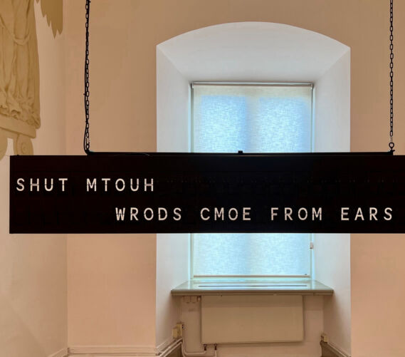 Shilpa Gupta, Words Come From Ears, 2018, Motion flapboard, 15-minute loop, 43 x 244 x 13 cm; photograph by Par Fredin, courtesy of the artist, Uppsala Art Museum, and the Henry Moore Institute.